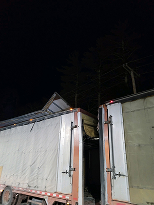 tractor trailer under electric wires